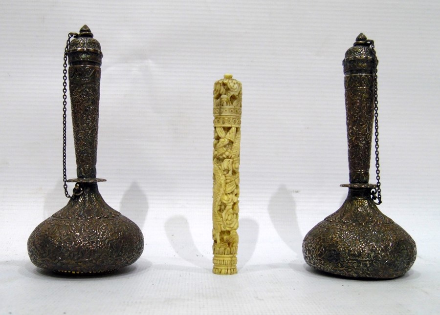 Pair of Indian white metal scent bottles with cove