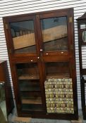 Mahogany bookcase having recessed brass handles, 1