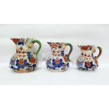 Three graduated Masons Ironstone pottery jugs, 'Im