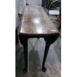 19th century mahogany swing leg table on turned su