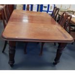 Victorian mahogany extending dining table on turne