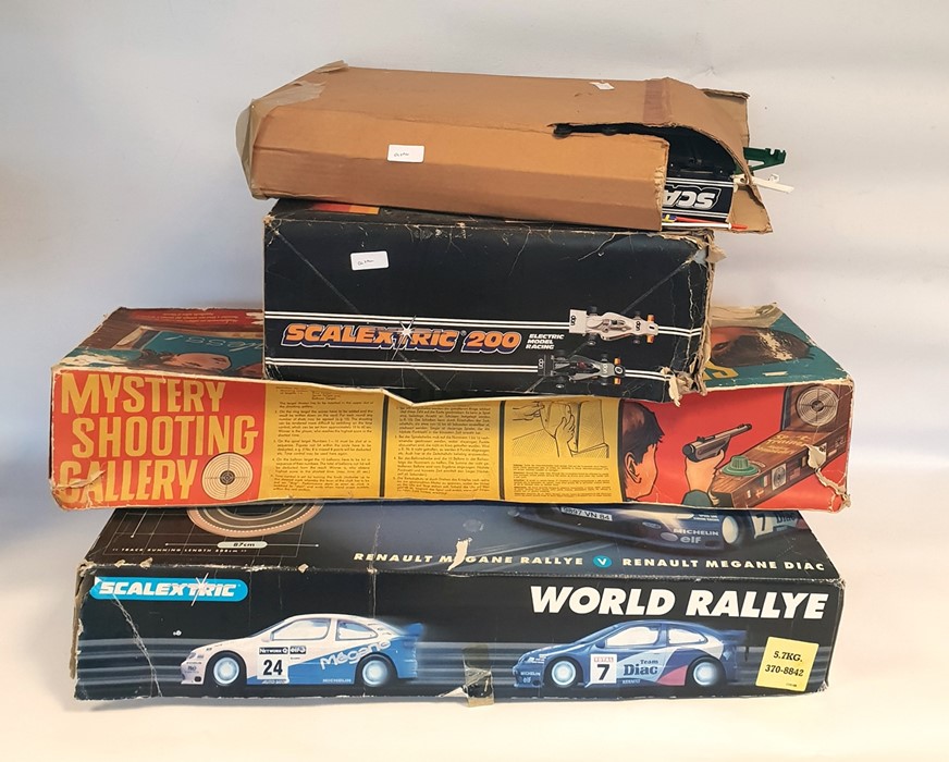 Scalextric World Rally set and a Scalextric 200 set, both boxed, a Sport Trainer, boxed and a box o