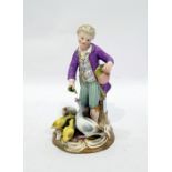 19th century Meissen figure of young boy feeding g