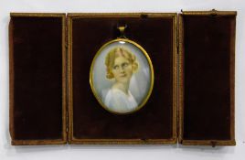 Miniature portrait of a young girl, in fitted leat