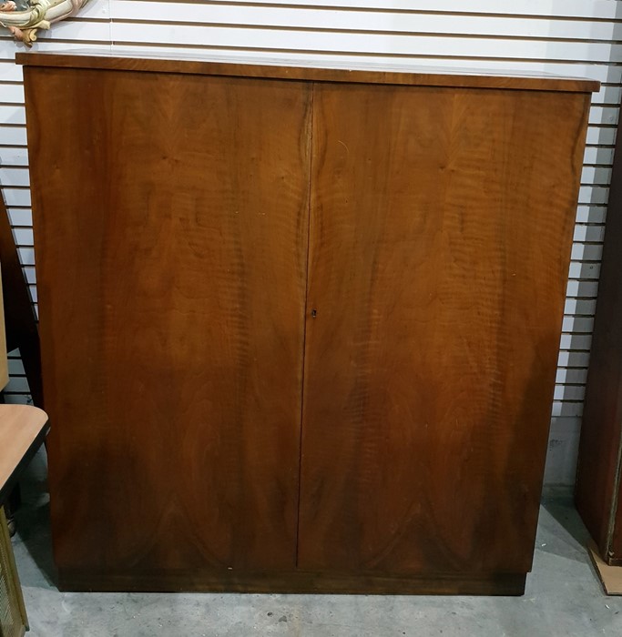 Dwarf walnut veneered two-door cupboard, 107cm wid