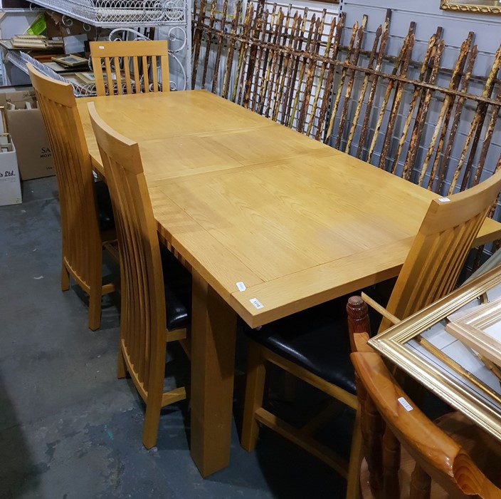 Modern beech dining table and a set of four chairs