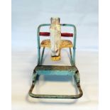 Small child's painted metal rocking horse