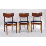 Three laminated teak-finish dining chairs with bla