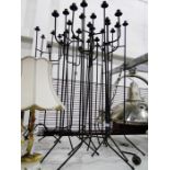 Eight metal candle sconces (8)
