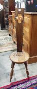 Welsh oak spinning chair with circular seat, on tu