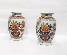 Pair of Japanese porcelain baluster-shaped vases w