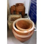 Terracotta garden planter in the form of an Indian