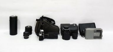 Pentax K100 camera with telefoto lens case, anothe