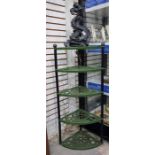 A Le Creuset cast iron potstand, painted dark gree