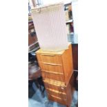 Two teak bedside chests of three drawers, a Lloyd