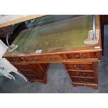 20th century yew wood pedestal desk of nine drawer