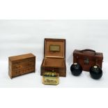 Bowling balls in leather case, miniature straw wor