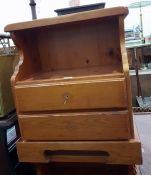 Two pine bedside tables and another pine square to