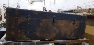 Modern coffee table in the form of a steamer trunk