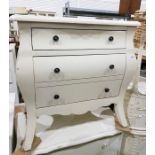 Cream painted bombe fronted chest of three drawers