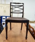 Set of four mahogany framed cane seated chairs wit