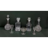 Four various cut glass decanters, two cut stem win