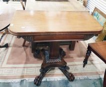 19th century mahogany swivel top tea table with fo