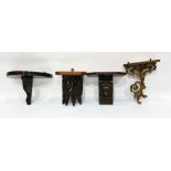 Four various carved wall brackets