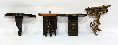 Four various carved wall brackets