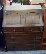 Mid 20th century dark stained bureau in the Jacobe