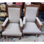 Two Edwardian walnut framed upholstered elbow chai