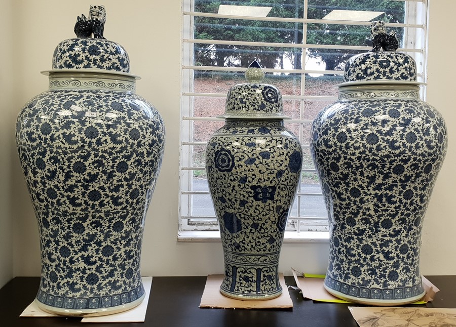 Pair of modern Chinese foliate decorated lidded fl
