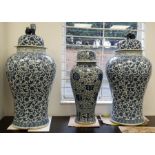 Pair of modern Chinese foliate decorated lidded fl