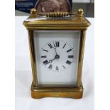French carriage clock with enamel dial and Roman n
