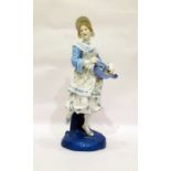 Continental porcelain figure of girl in blue dress