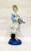 Continental porcelain figure of girl in blue dress