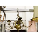 Brass ceiling light of central bulbous form with e