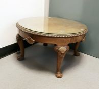 Walnut circular top coffee table with loose glass
