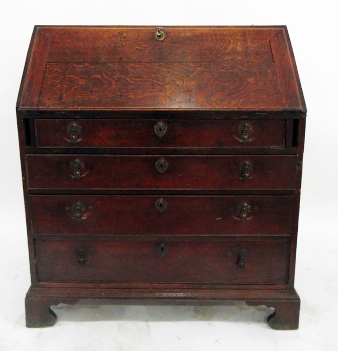 Early 19th century oak bureau, the fall revealing