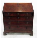 Early 19th century oak bureau, the fall revealing