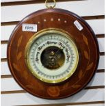Aneroid barometer with an enamel dial and within a