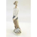 Lladro figure of medieval style with fencing foil and pile of books, 30cm high (damaged) and a