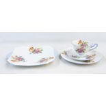 Shelley china tea service for six persons, all floral spray decorated with blue borders, including