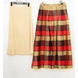 Cojona Sport knitted skirt, a tartan silk evening skirt, a Cojona Sport knitted dress, a Timware,