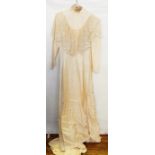 1970's silk high-necked wedding dress with antique lace detail and train