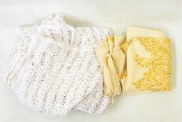 Large cream wool shawl embroidered with yellow thread and a pair of cut and drawn curtains/bedcovers