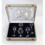 Set of six mid 20th century Moser glass small tumblers, each a different colour, in satin and velvet