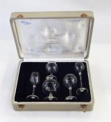 Set of six mid 20th century Moser glass small tumblers, each a different colour, in satin and velvet