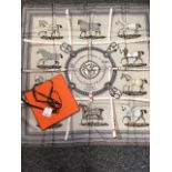 Hermes silk scarf - Couvertures et Tenues de Jour, taupe, 1974 Jacques Eudel, with original box, and