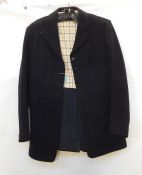 Black hunt coat made by Swain & Adeney with double buttons at the back - hunt buttons replaced